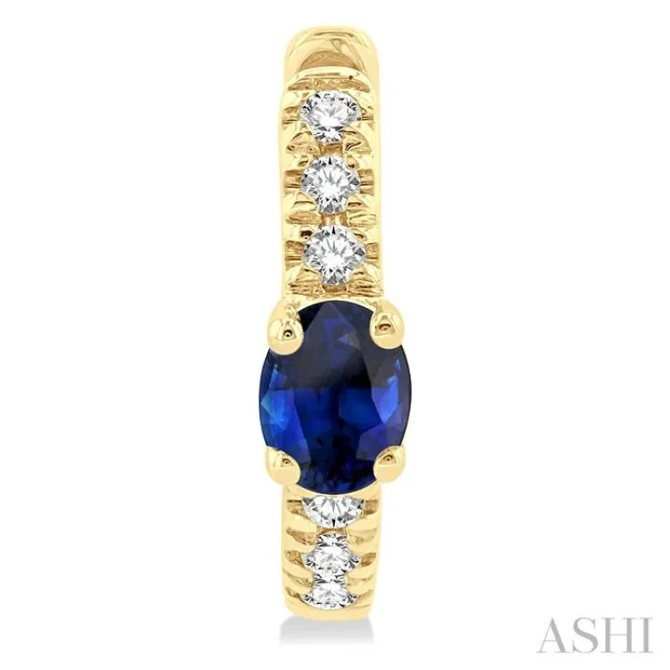 1/10 ctw Petite 4X3MM Oval Cut Sapphire and Round Cut Diamond Fashion Huggies in 10K Yellow Gold