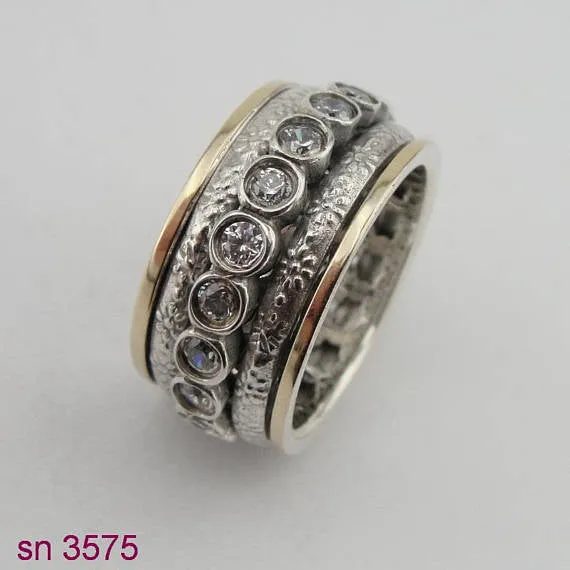 Two Gold & Silver Ring and in Center Studded Zircons Swivel Ring